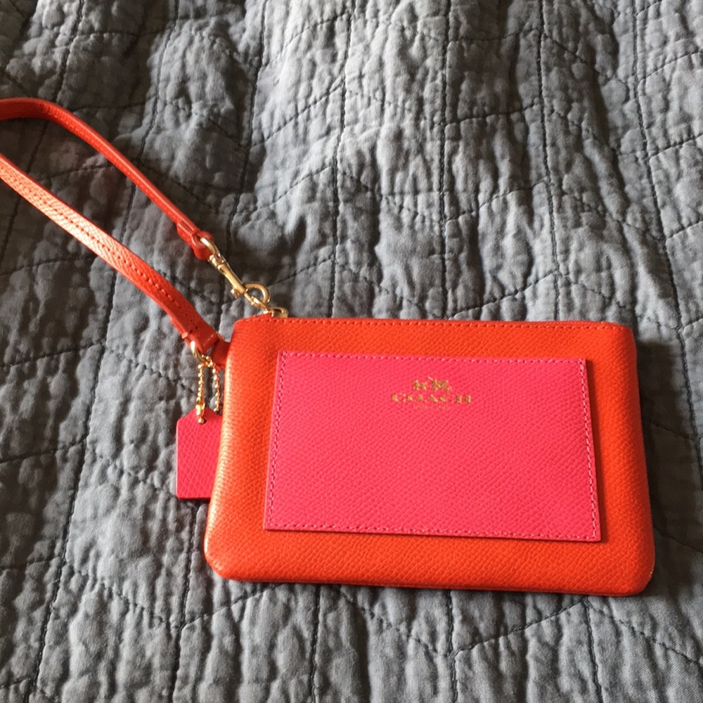 Coach orange and pink wristlet nwot